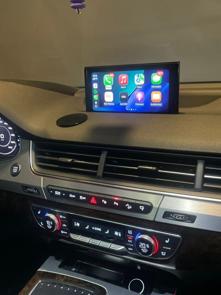 Apple CarPlay activated on Audi Q7 2017 MMI screen showing Phone, Music, Maps and Messages