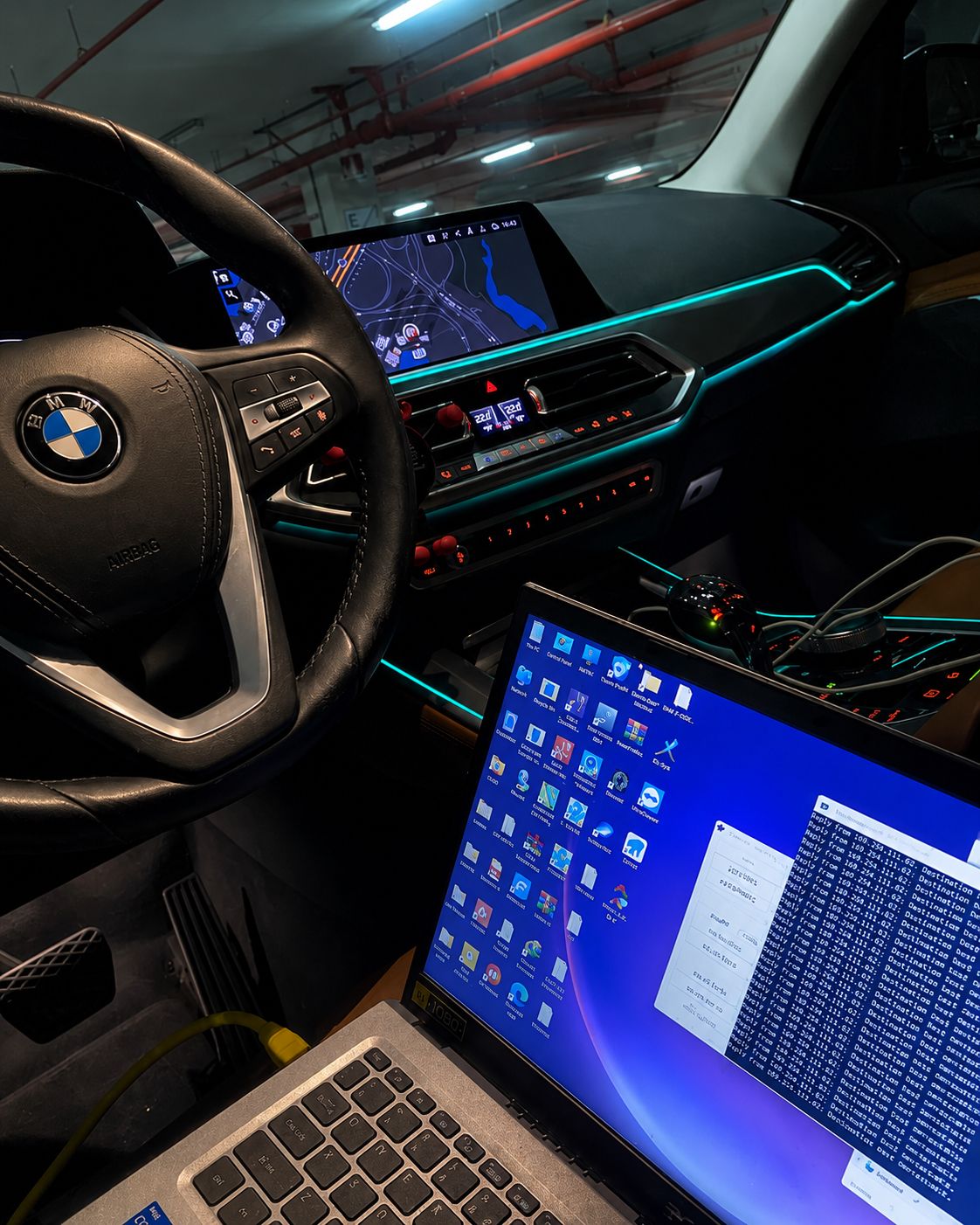 BMW factory CarPlay coding with laptop in Dubai by Weiss Auto Concept