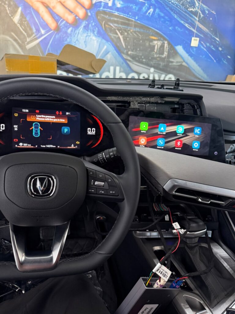 CarPlay interface installation in progress on 2025 Changan CS35 Plus at Weiss Auto Concept Dubai