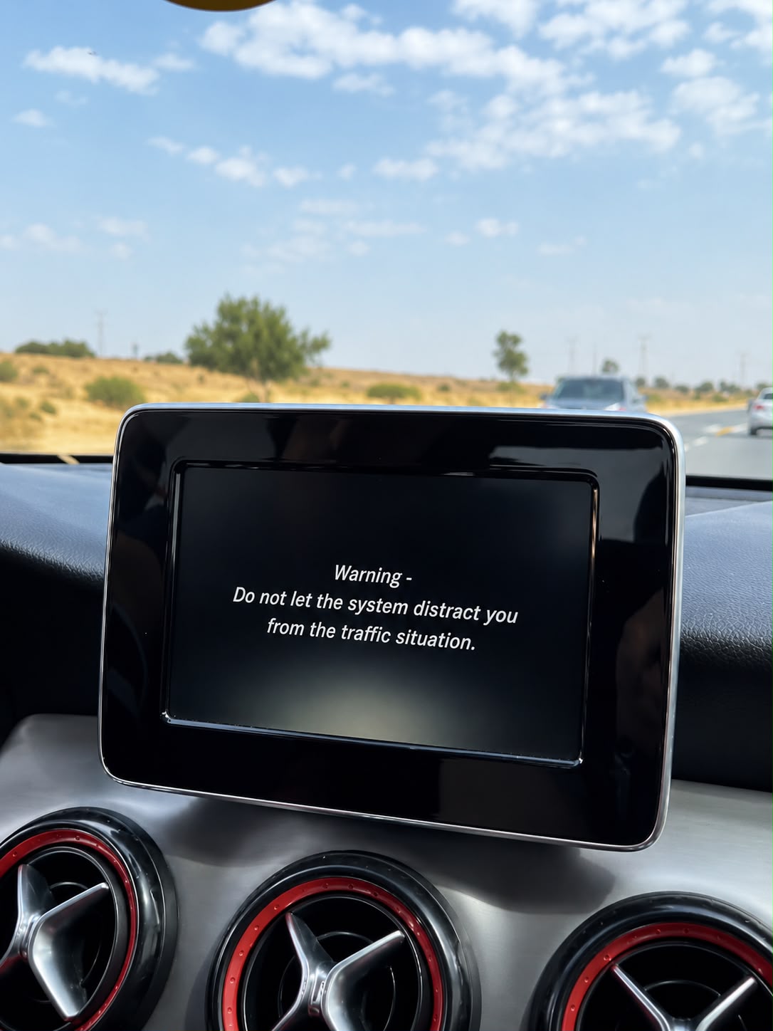 Mercedes CLA250 original 7-inch COMAND screen before replacement in Dubai