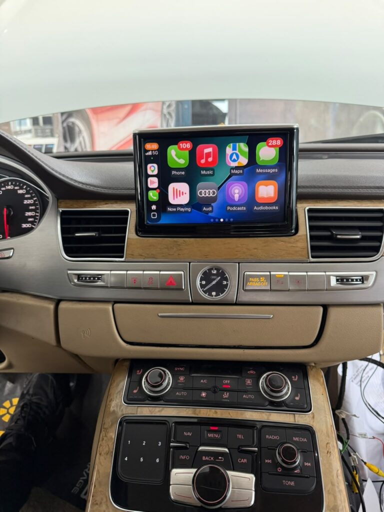 2012 Audi A8 with wireless Apple CarPlay on the factory MMI 3G screen installed by Weiss Auto Concept Dubai