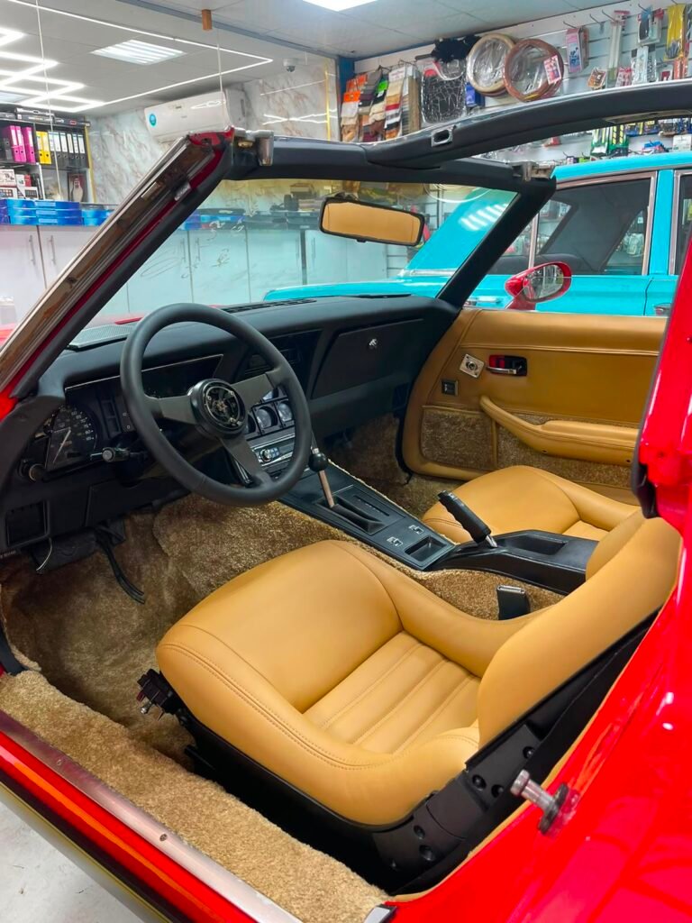 Restored tan leather interior of a classic Corvette C3 by Weiss Auto Concept Dubai