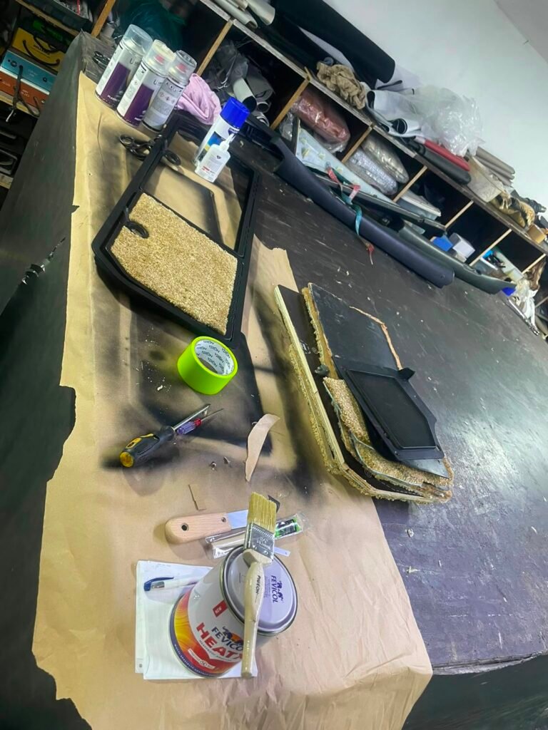 Classic car trim panels being rebuilt in the Weiss Auto Concept upholstery workshop