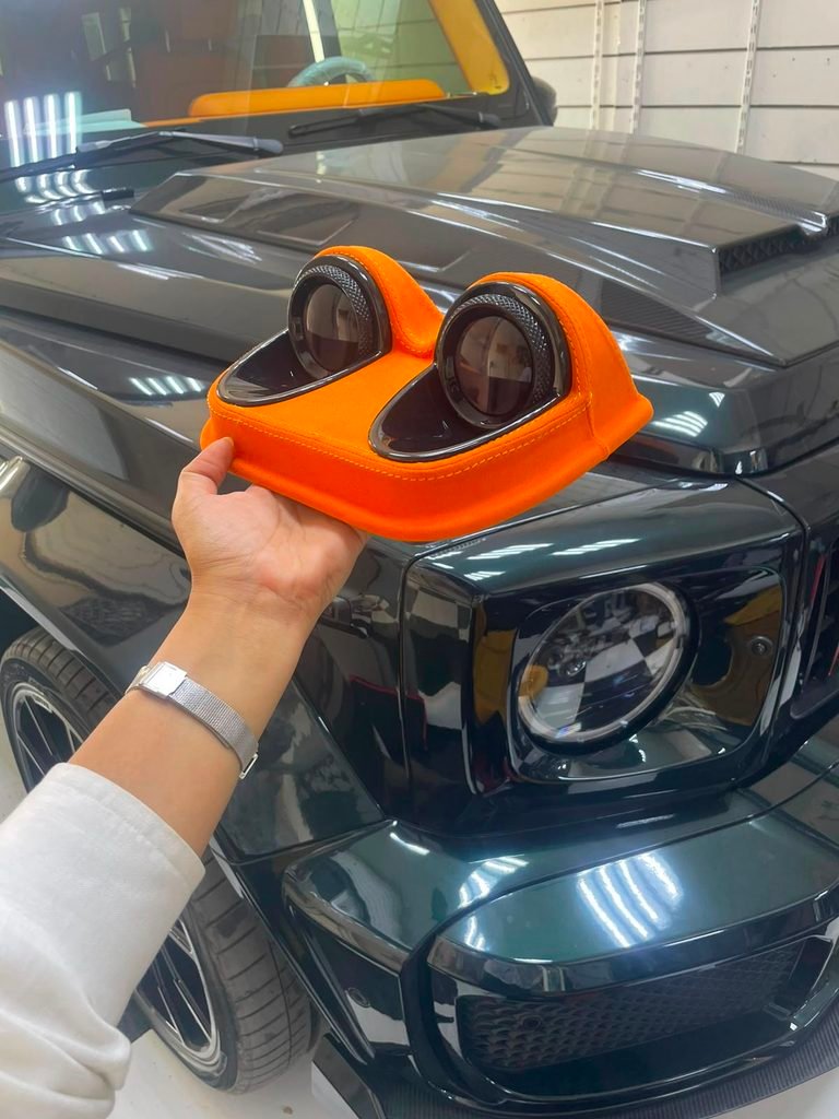 Roof instrument cluster trimmed in orange Alcantara before installation, Weiss Auto Concept Dubai