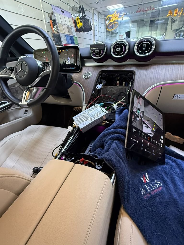 360 camera interface module installed behind the MBUX screen of a Mercedes CLE
