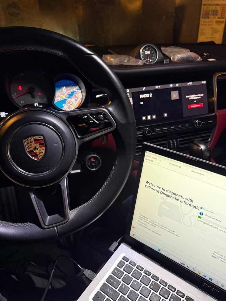 Porsche Macan PCM 5.0 software flash in progress at Weiss Auto Concept Dubai