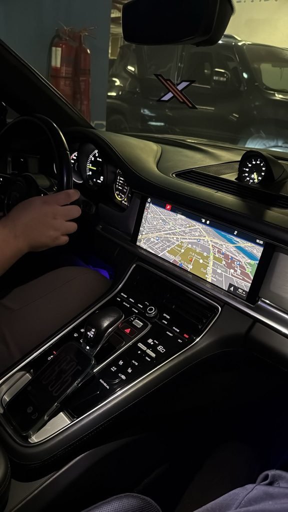 Porsche Panamera PCM 4.0 navigation showing Dubai streets near Oud Metha Road